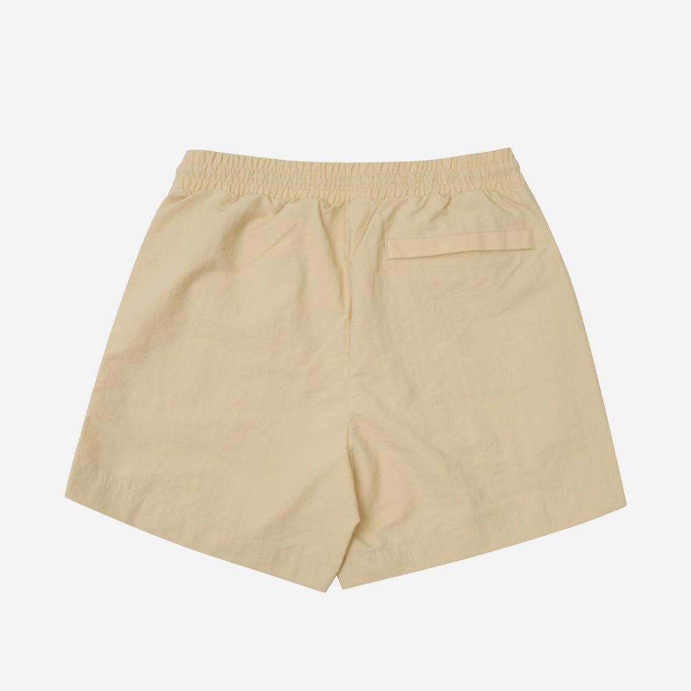 Quần Ngắn Nữ Fila Nylon Woven - Vàng - Supersports Vietnam