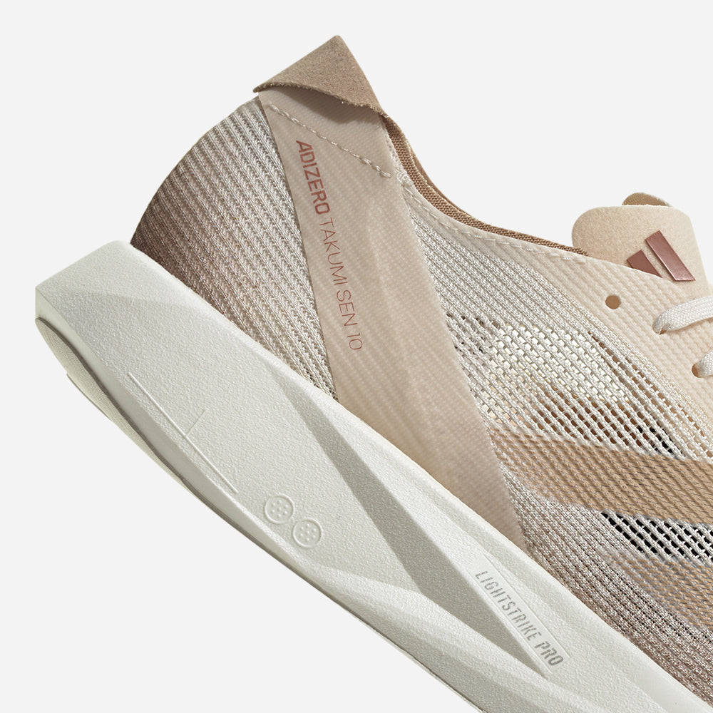 Giày Chạy Bộ Nữ Adidas Adizero Takumi Sen 10 - Nâu - Supersports Vietnam